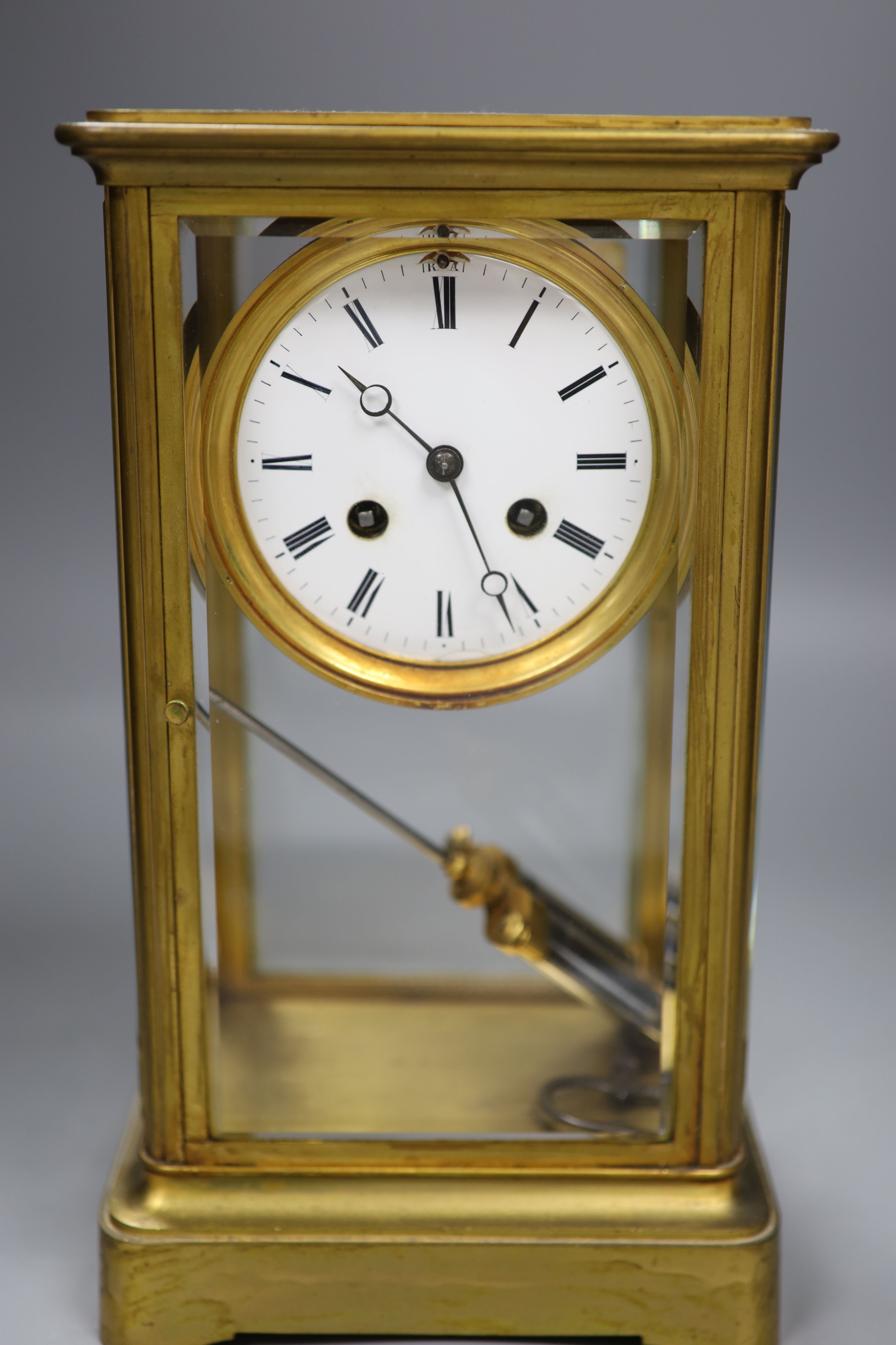 A 19th century French four-glass mantel clock, bell-striking movement with countwheel, mercury pendulum, with key, 30cm high